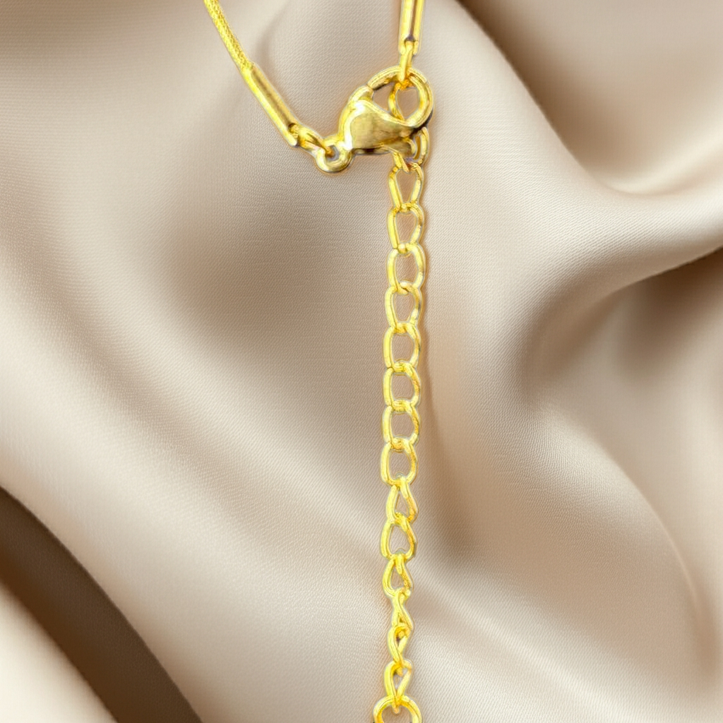 Gold-toned snake  pendant