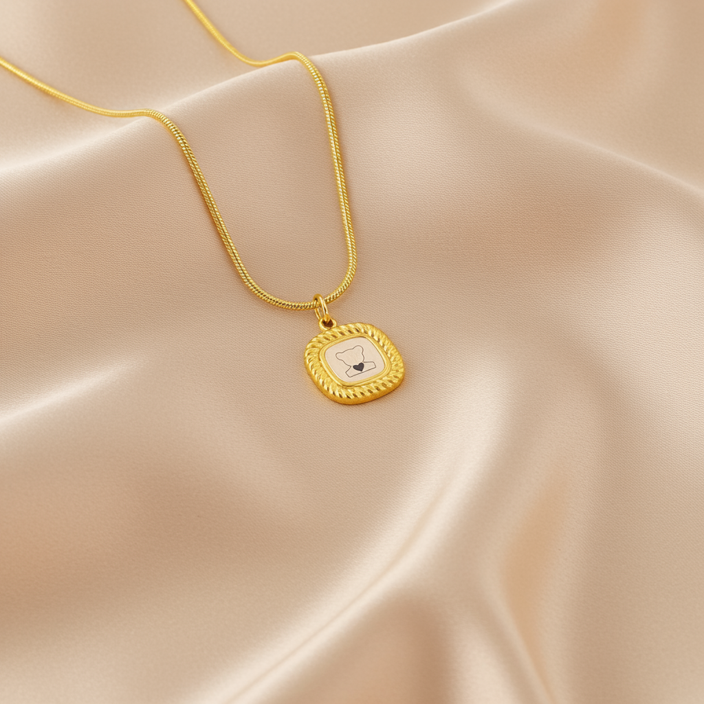 Gold-toned snake  pendant