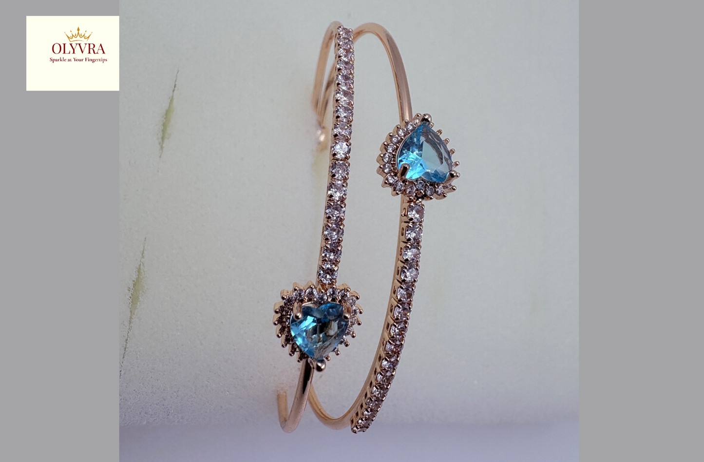 Rose gold-plated sky-blue stones open bangle |Olyvra