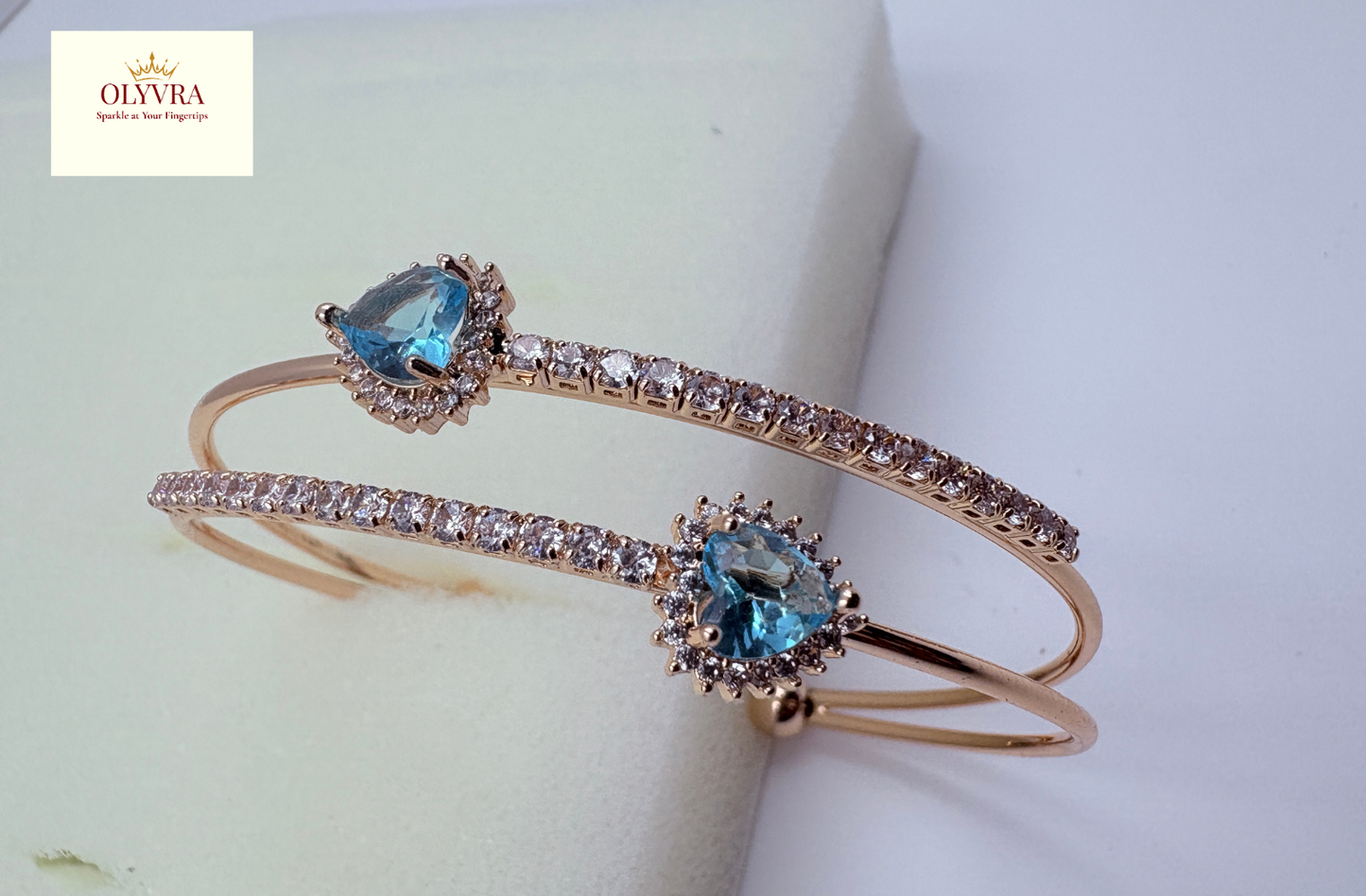 Rose gold-plated sky-blue stones open bangle |Olyvra
